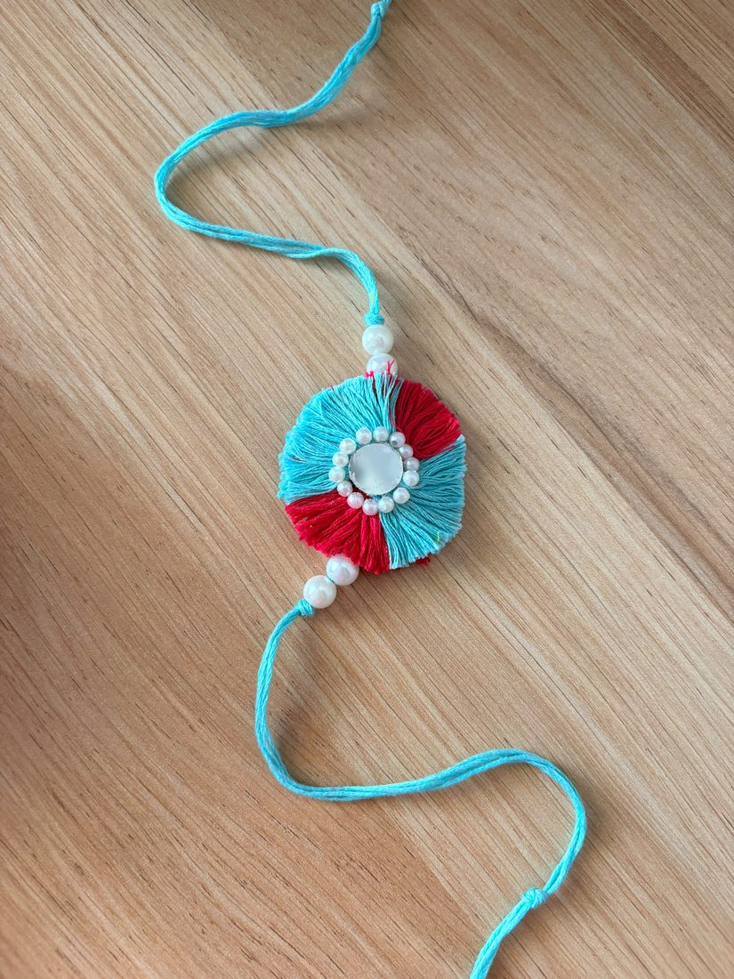 Mirror Pom-Pom Rakhi — handmade crochet rakhi by TASSELA
